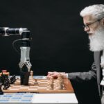 A man playing chess with a robotic arm powered with AI