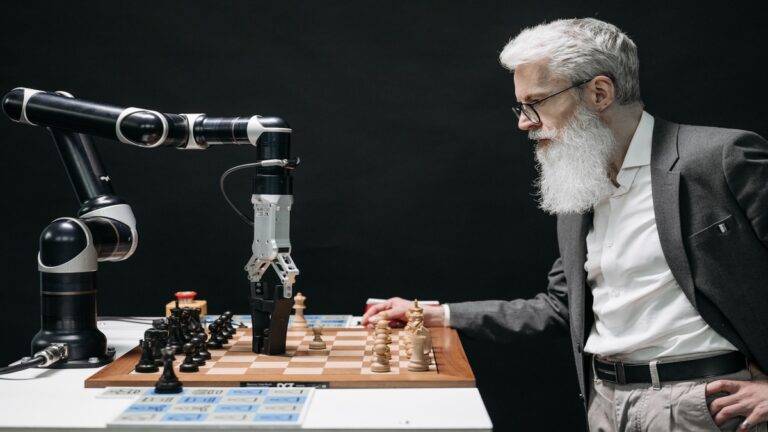 A man playing chess with a robotic arm powered with AI
