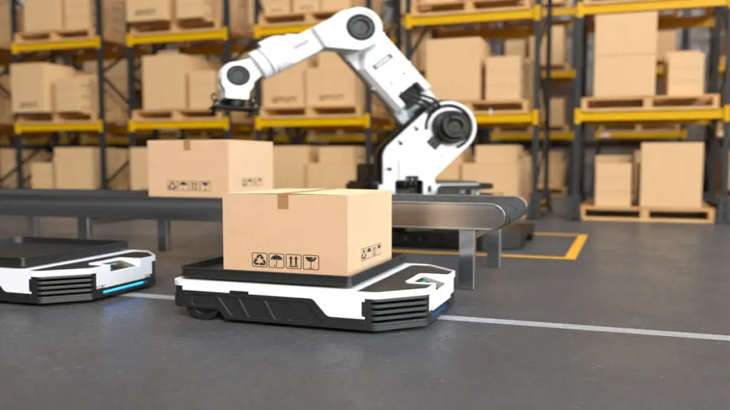 The Robot arm picks up the box to Autonomous Robot transportation
